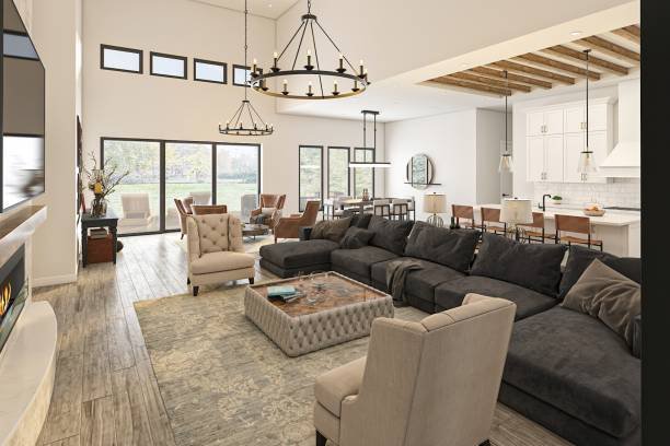 Modern kitchen with white cabinets, a large island, pendant lights, and wooden accents.