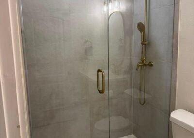 Tub-to-Shower Conversion with Brushed Gold Fixtures
