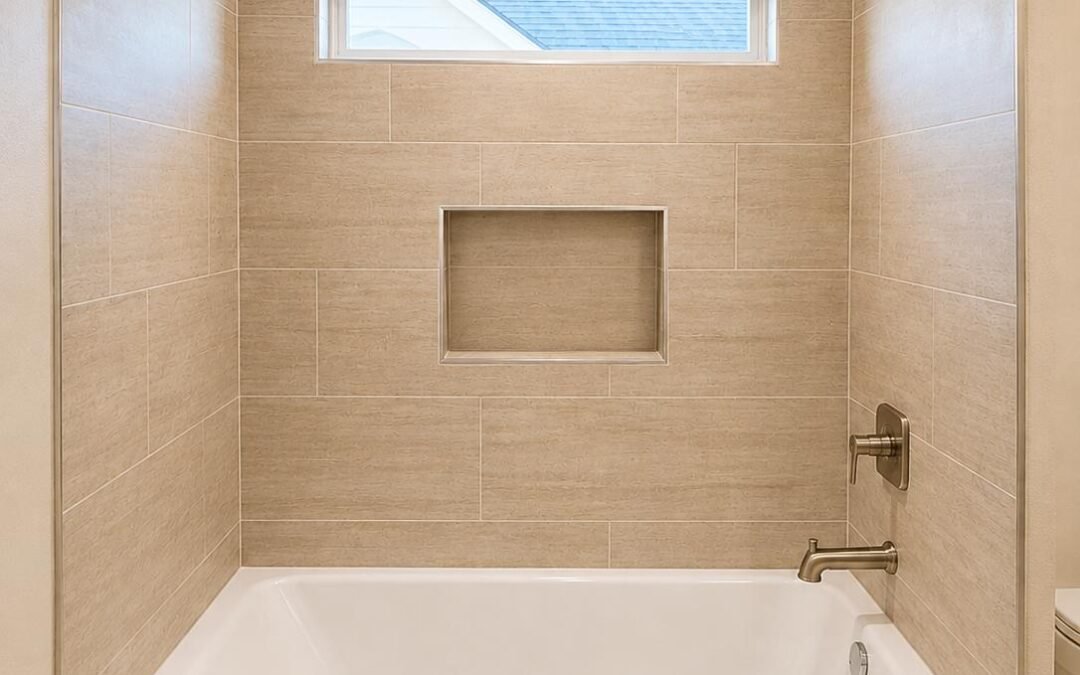 Tub and Shower Remodel with Large-Format Tile and Built-In Niche